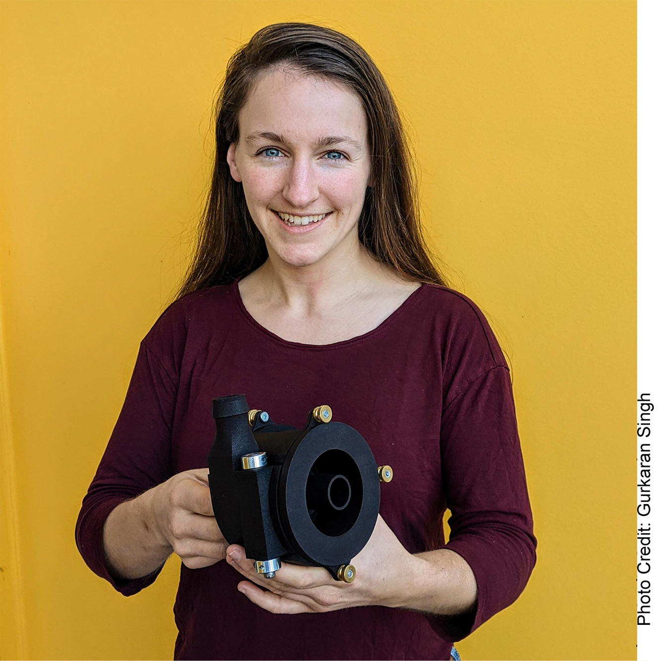 MIT graduate student Hilary Johnson, holding her variable volute pump