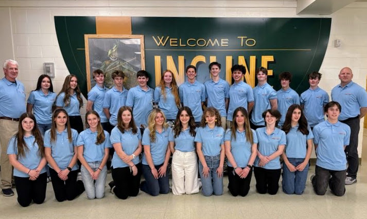 The Incline High School LMIT Team, all posed in their blue shirts. 