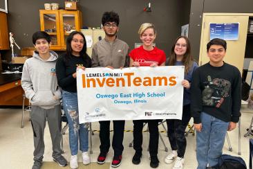 Here is a photo of the Oswego East InvenTeam with their official banner.