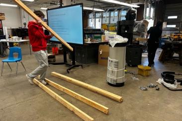 An Incline Village LMIT Team Member building our demonstration model out of wood. 